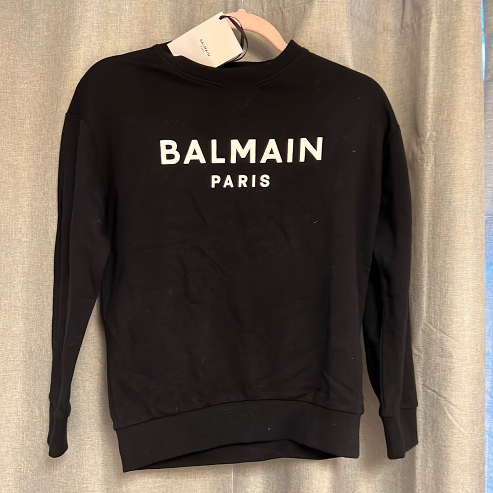 Balmain black sweatshirt size 12 youth, fits XS women.  Purchased from SSENSE